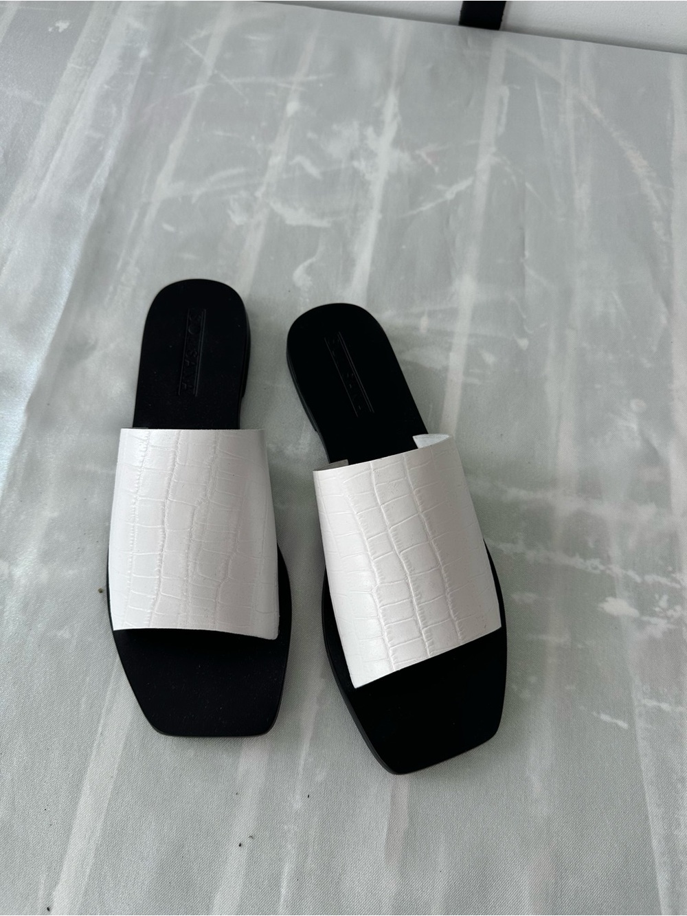 White Croc-Embossed Slide Mules with Black Footbed